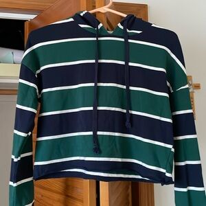 Cute hoodie, not fading. Forest green and navy and white in size small